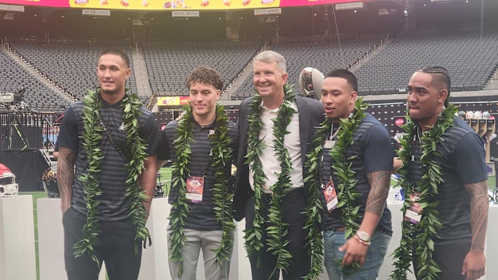 Arizona Wildcats football players (left to right) Tetairoa McMillan, Gunner Maldanado, Coach Brent Brennan, Jacob Manu and Noah Fifita at the Big 12 Conference's Media Day on July 10, 2024.
