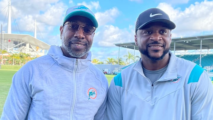 New Dolphins assistant coaches Sam Madison (left) and Patrick Surtain meet with reporters at the