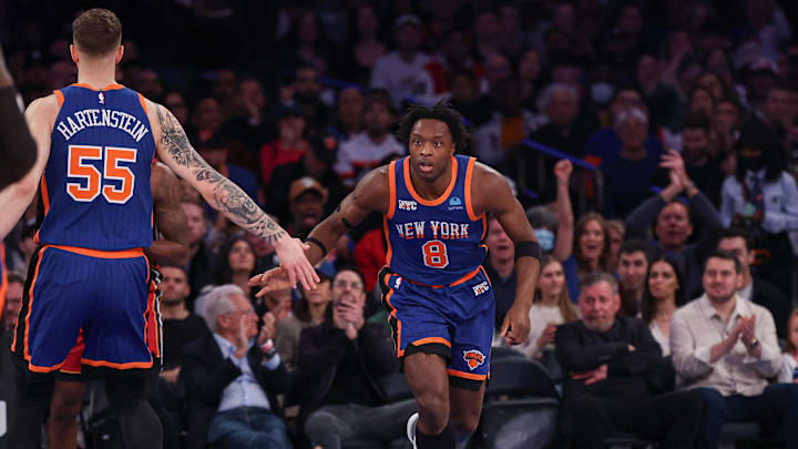 Jan 27, 2024; New York, New York, USA; New York Knicks forward OG Anunoby (8) slaps hands with center Isaiah Hartenstein (55) after a basket against the Miami Heat during the first half at Madison Square Garden. Mandatory Credit: Vincent Carchietta-USA TODAY Sports