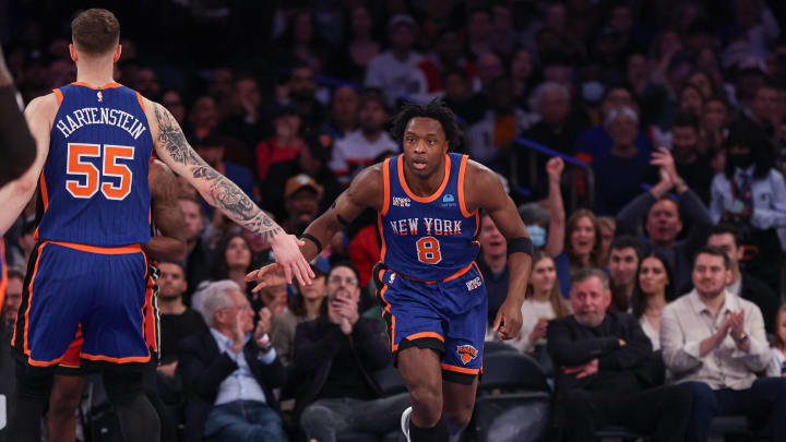 Jan 27, 2024; New York, New York, USA; New York Knicks forward OG Anunoby (8) slaps hands with center Isaiah Hartenstein (55) after a basket against the Miami Heat during the first half at Madison Square Garden. Mandatory Credit: Vincent Carchietta-USA TODAY Sports