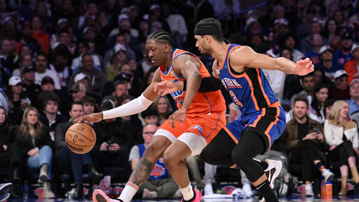 Mar 31, 2024; New York, New York, USA; Oklahoma City Thunder forward Jalen Williams (8) brings the ball up court while being defended by New York Knicks guard Josh Hart (3) during the third quarter at Madison Square Garden. Mandatory Credit: John Jones-USA TODAY Sports