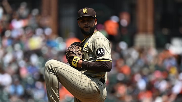 Jul 28, 2024; Baltimore, Maryland, USA;  San Diego Padres starting pitcher Randy Vasquez (98) delivers a pitch during the first inning against the Baltimore Orioles at Oriole Park at Camden Yards. Mandatory Credit: James A. Pittman-Imagn Images