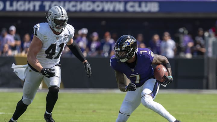 Sep 15, 2024; Baltimore, Maryland, USA; Baltimore Ravens wide receiver Rashod Bateman (7) runs after the catch as Las Vegas Raiders linebacker Robert Spillane (41) defends during the first quarter at M&T Bank Stadium. Mandatory Credit: Tommy Gilligan-Imagn Images Sep 15, 2024; Baltimore, Maryland, USA; Baltimore Ravens wide receiver Rashod Bateman (7) runs after the catch as Las Vegas Raiders linebacker Robert Spillane (41) defends during the first quarter at M&T Bank Stadium. Mandatory Credit: Tommy Gilligan-Imagn Images