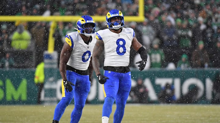 Jan 19, 2025; Philadelphia, Pennsylvania, USA; Los Angeles Rams linebacker Byron Young (0) and linebacker Jared Verse (8) celebrate a sack against the Philadelphia Eagles in a 2025 NFC divisional round game at Lincoln Financial Field. Mandatory Credit: Eric Hartline-Imagn Images Jan 19, 2025; Philadelphia, Pennsylvania, USA; Los Angeles Rams linebacker Byron Young (0) and linebacker Jared Verse (8) celebrate a sack against the Philadelphia Eagles in a 2025 NFC divisional round game at Lincoln Financial Field. Mandatory Credit: Eric Hartline-Imagn Images