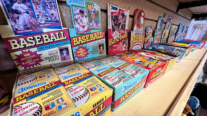 Unopened older baseball cards are for sale at Action Mania Toys and Collectibles. Unopened older baseball cards are for sale at Action Mania Toys and Collectibles.