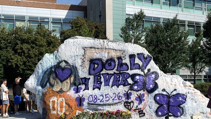 A Dolly Parton memorial is present on the Rock on the University of Tennessee at Knoxville, pictured here Aug. 26 the day after her death. Students and fans are leaving flowers and lighting candles at the base of the Rock to pay their respects. A Dolly Parton memorial is present on the Rock on the University of Tennessee at Knoxville, pictured here Aug. 26 the day after her death. Students and fans are leaving flowers and lighting candles at the base of the Rock to pay their respects.