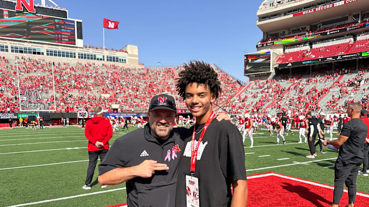 2027 four-star quarterback Trae Taylor with Nebraska football coach Matt Rhule after the Rutgers game.