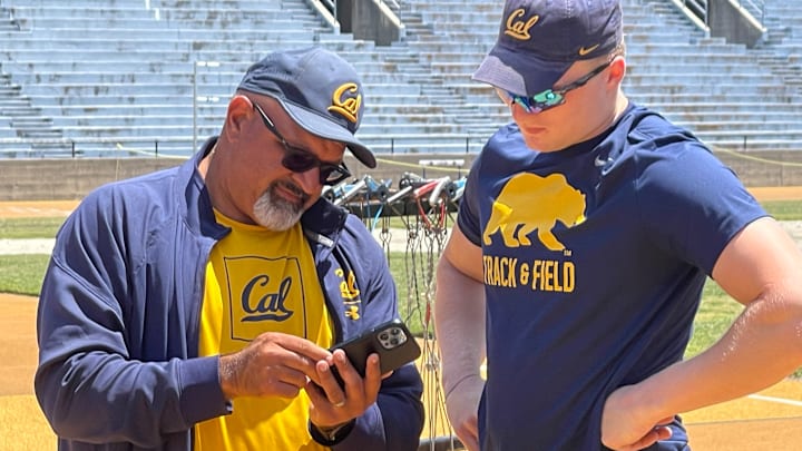 Mo Saatara with Cal discus star Mykolas Alekna