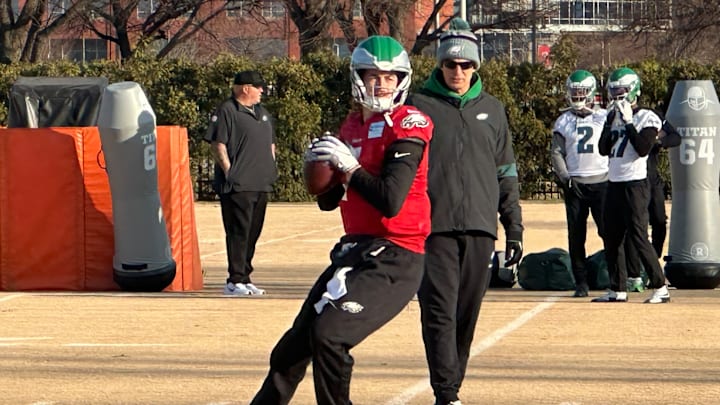 Eagles QB Kenny Pickett throws on Dec. 26, 2024 with QB coach Doug Nussmeier looking on. 