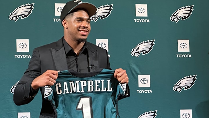 Jihaad Campbell shows off his first-round pick jersey on April 25,  2025.