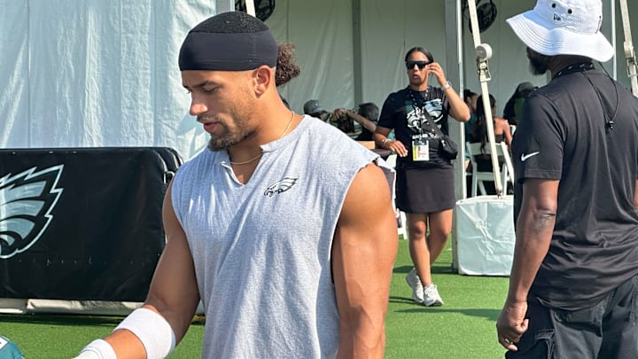 Eagles S Sydney Brown stops to sign an autograph for a young fan at training camp on Aug. 3, 2025. Eagles S Sydney Brown stops to sign an autograph for a young fan at training camp on Aug. 3, 2025.