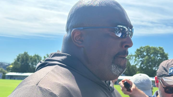 Eagles defensive line coach Clint Hurtt speaks with reporters after practice on Aug. 9, 2025.