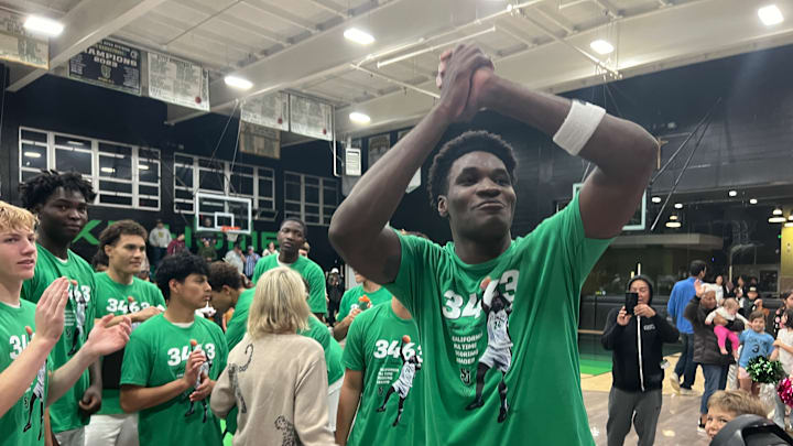 Tounde Yessoufou gives one last acknowledgement to crowd after he scored 30 points to break the California High School career scoring record Saturday at St. Joseph of Santa Maria High School. Following video tribute and speech from Yessoufou who now has 3,467 points to surpass Demarcus Nelson's 3,462. The class Nelson sent a video congratulations message to Yessoufou as well. 