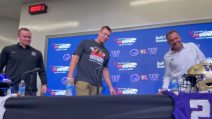 Rob Gronkowski, LA Bowl ambassador, shares the podium with Boise State's Spencer Danielson and Jedd Fisch. Rob Gronkowski, LA Bowl ambassador, shares the podium with Boise State's Spencer Danielson and Jedd Fisch.