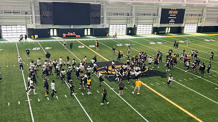 Thursday, March 11, 2025; Columbia, Missouri, USA; The Missouri Tigers begin to huddle up as spring practice comes to a close. Thursday, March 11, 2025; Columbia, Missouri, USA; The Missouri Tigers begin to huddle up as spring practice comes to a close.