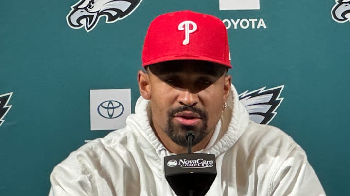 Jalen Hurts speaks to reports at the start of Eagles' offseason work.
