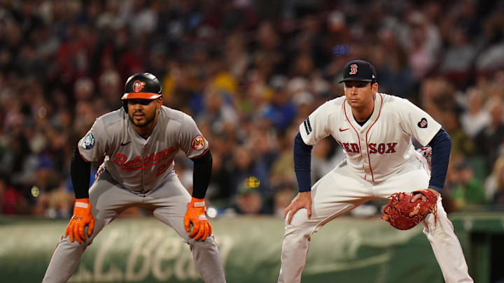 Baltimore Orioles designated hitter Anthony Santander (25) at first base with Boston Red Sox first baseman Triston Casas (36) in the first inning at Fenway Park in 2024.