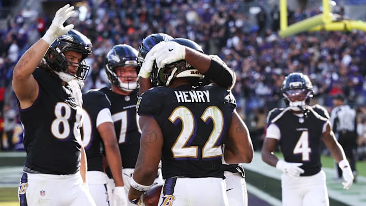 Oct 26, 2025; Baltimore, Maryland, USA; Baltimore Ravens running back Derrick Henry (22) celebrates with teammates after scoring a touchdown against the Chicago Bears in the fourth quarter at M&T Bank Stadium. Mandatory Credit: Geoff Burke-Imagn Images