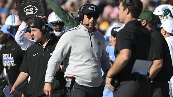 Nov 16, 2024; Annapolis, Maryland, USA; Tulane Green Wave head coach Jon Sumrall walks down the sidelines during the first half against the Navy Midshipmen  at Navy-Marine Corps Memorial Stadium. 