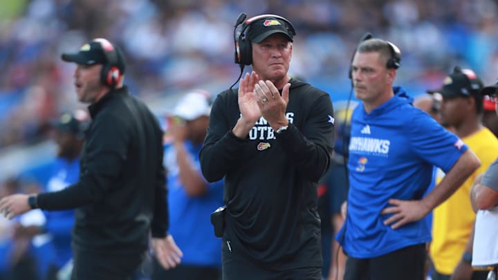 Kansas Jayhawks head coach Lance Leipold applauds on the sidelines during the first half of the game against West Virginia Mountaineers at David Booth Kansas Memorial Stadium on Sept. 20, 2025.