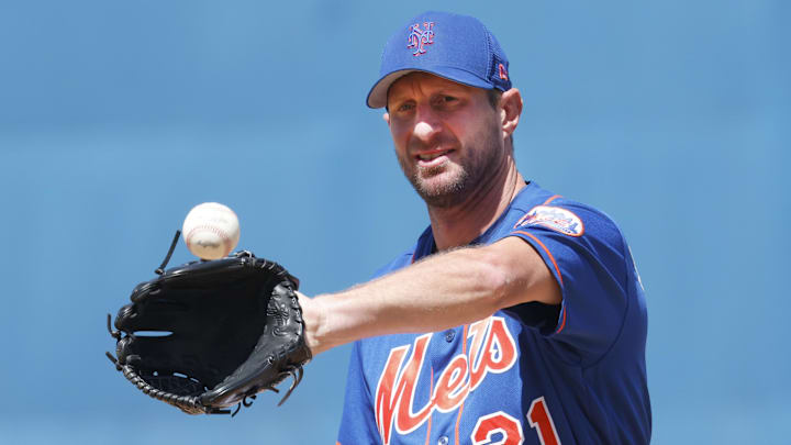 Mar 27, 2022; Port St. Lucie, Florida, USA; New York Mets starting pitcher Max Scherzer (21) warms