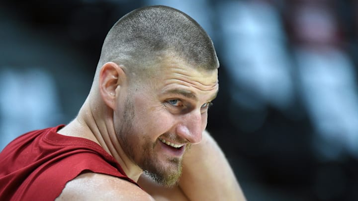 Apr 18, 2026; Denver, Colorado, USA; Denver Nuggets center Nikola Jokic (15) warms up before the game against the Minnesota Timberwolves during game one of the first round of the 2026 NBA Playoffs at Ball Arena. Mandatory Credit: Christopher Hanewinckel-Imagn Images