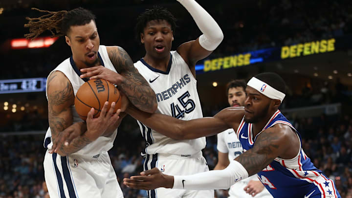 Apr 6, 2024; Memphis, Tennessee, USA; Memphis Grizzlies forward Brandon Clarke (left), forward GG Jackson (45) and Philadelphia 76ers forward Paul Reed (44) battle for a rebound during the first half at FedExForum. Mandatory Credit: Petre Thomas-Imagn Images