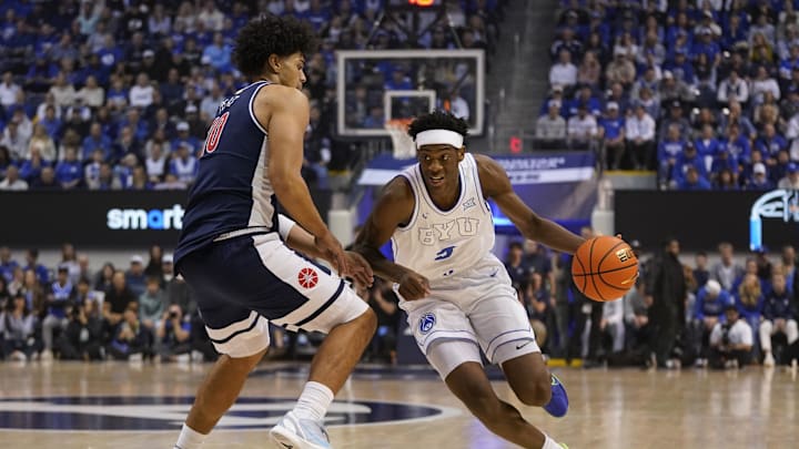 Jan 26, 2026; Provo, Utah, USA; BYU Cougars forward AJ Dybantsa (3) drives while being defended by Arizona Wildcats forward Koa Peat (10) during the first half at Marriott Center. Mandatory Credit: Aaron Baker-Imagn Images 