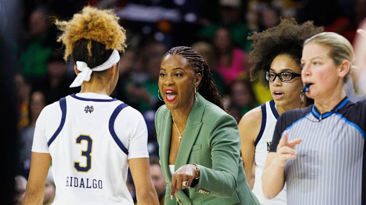 Notre Dame head coach Niele Ivey coaches guard Hannah Hidalgo (3) during a NCAA women's basketball game between Notre Dame and SMU at Purcell Pavilion on Sunday, Jan. 19, 2025, in South Bend.