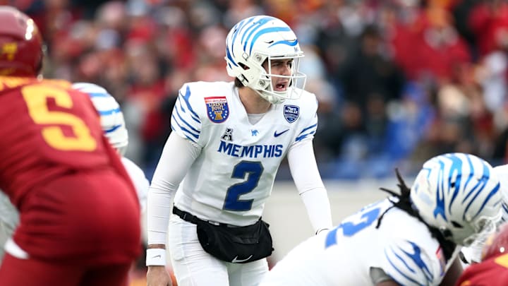 Dec 29, 2023; Memphis, TN, USA; Memphis Tigers quarterback Seth Henigan (2) waits for the snap during the first half against the Iowa State Cyclones at Simmons Bank Liberty Stadium. Mandatory Credit: Petre Thomas-USA TODAY Sports Dec 29, 2023; Memphis, TN, USA; Memphis Tigers quarterback Seth Henigan (2) waits for the snap during the first half against the Iowa State Cyclones at Simmons Bank Liberty Stadium. Mandatory Credit: Petre Thomas-USA TODAY Sports