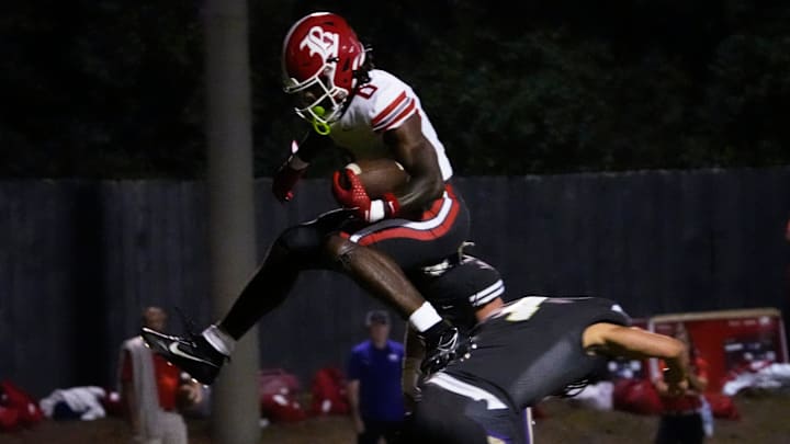Baylor’s David Gabriel Georges jumps over CPA’s Roman Abbagnaro during the game between Baylor and CPA at Christ Presbyterian Academy in Nashville, Tenn., Friday, Sept. 19, 2025.