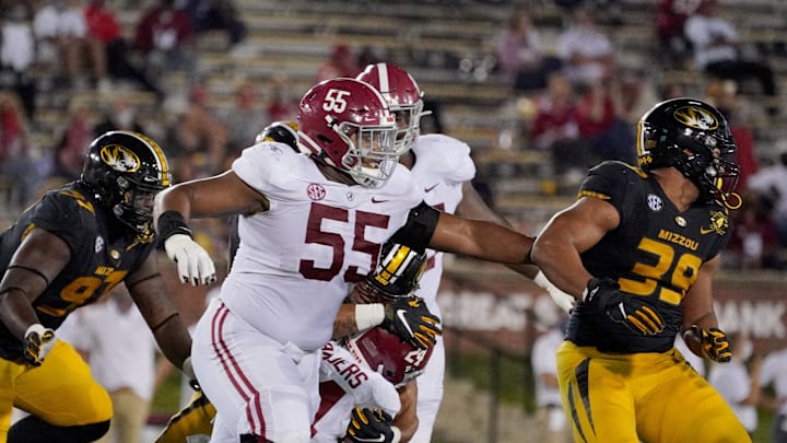 Sep 26, 2020; Columbia, Missouri, USA; Alabama Crimson Tide offensive lineman Emil Ekiyor Jr. (55) makes a block on Missouri Tigers defensive lineman Chris Turner (39) during the game at Faurot Field at Memorial Stadium. Mandatory Credit: Denny Medley-Imagn Images Sep 26, 2020; Columbia, Missouri, USA; Alabama Crimson Tide offensive lineman Emil Ekiyor Jr. (55) makes a block on Missouri Tigers defensive lineman Chris Turner (39) during the game at Faurot Field at Memorial Stadium. Mandatory Credit: Denny Medley-Imagn Images