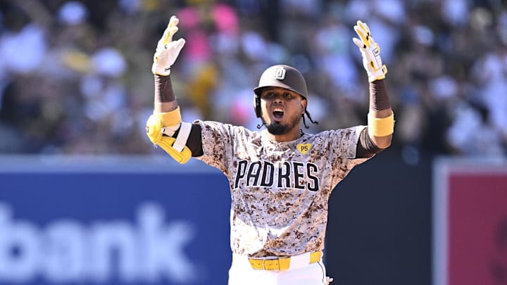 Sep 22, 2024; San Diego, California, USA; San Diego Padres first baseman Luis Arraez (4) celebrates after hitting an RBI double against the Chicago White Sox during the eighth inning at Petco Park. Mandatory Credit: Orlando Ramirez-Imagn Images Sep 22, 2024; San Diego, California, USA; San Diego Padres first baseman Luis Arraez (4) celebrates after hitting an RBI double against the Chicago White Sox during the eighth inning at Petco Park. Mandatory Credit: Orlando Ramirez-Imagn Images