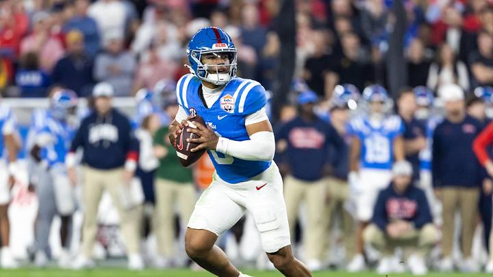 Jan 8, 2026; Glendale, AZ, USA; Detailed view of the jersey of Mississippi Rebels quarterback Trinidad Chambliss (6) against the Miami Hurricanes during the 2026 Fiesta Bowl and semifinal game of the College Football Playoff at State Farm Stadium. Mandatory Credit: Mark J. Rebilas-Imagn Images Jan 8, 2026; Glendale, AZ, USA; Detailed view of the jersey of Mississippi Rebels quarterback Trinidad Chambliss (6) against the Miami Hurricanes during the 2026 Fiesta Bowl and semifinal game of the College Football Playoff at State Farm Stadium. Mandatory Credit: Mark J. Rebilas-Imagn Images