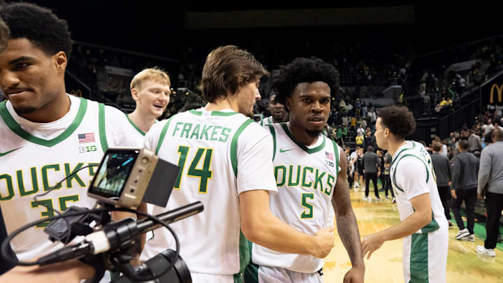 Players celebrate Oregon guard Takai Simpkins after the game as the Oregon Ducks host the Hawaii Rainbow Warriors on Nov. 4, 2025, at Matthew Knight Arena in Eugene, Oregon. Players celebrate Oregon guard Takai Simpkins after the game as the Oregon Ducks host the Hawaii Rainbow Warriors on Nov. 4, 2025, at Matthew Knight Arena in Eugene, Oregon.