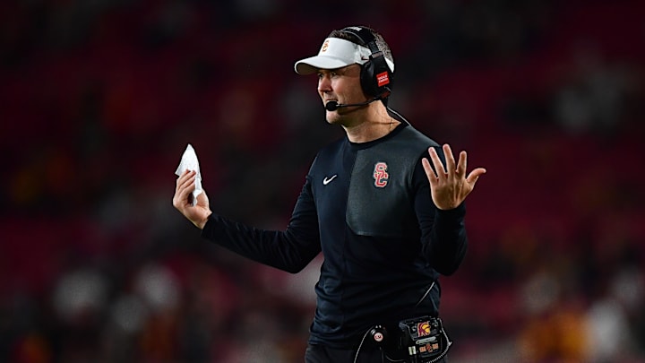 Sep 20, 2025; Los Angeles, California, USA; Southern California Trojans head coach Lincoln Riley watches game action against the Michigan State Spartans during the second half at the Los Angeles Memorial Coliseum. Mandatory Credit: Gary A. Vasquez-Imagn Images Sep 20, 2025; Los Angeles, California, USA; Southern California Trojans head coach Lincoln Riley watches game action against the Michigan State Spartans during the second half at the Los Angeles Memorial Coliseum. Mandatory Credit: Gary A. Vasquez-Imagn Images