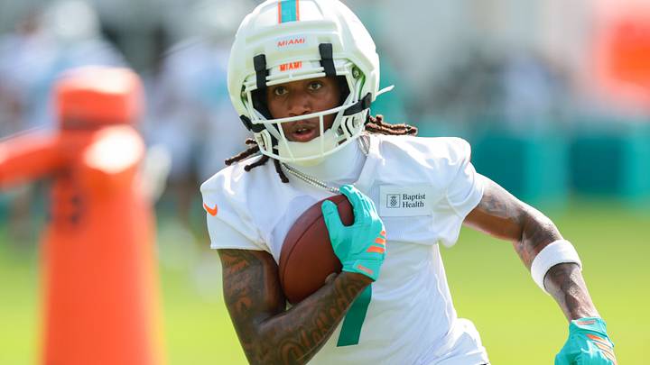 Miami Dolphins wide receiver Caleb Douglas (7) runs with the football during practice at Baptist Health Training Complex. Miami Dolphins wide receiver Caleb Douglas (7) runs with the football during practice at Baptist Health Training Complex.
