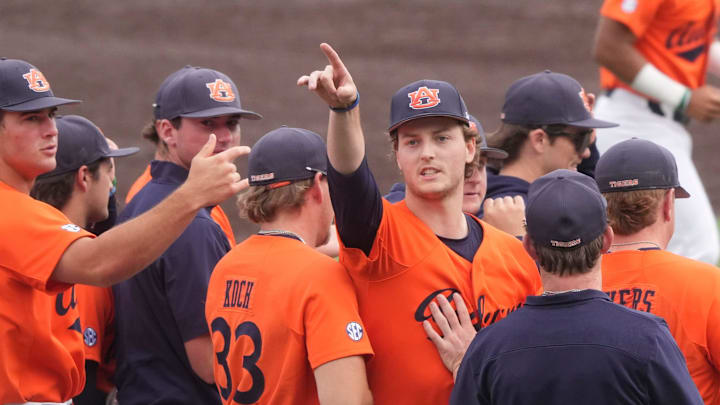 Auburn's Cade Fisher (3) points into the stands after the win over Tennessee in game 3 of the an NCAA baseball game series on May 4, 2025, in Knoxville, Tenn.
