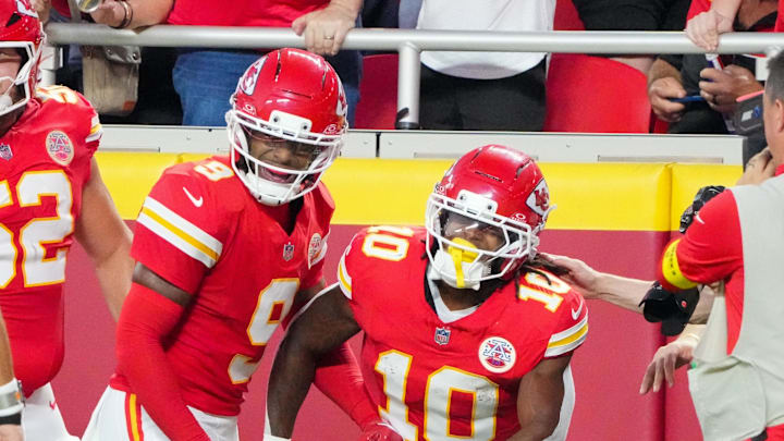Aug 22, 2025; Kansas City, Missouri, USA; Kansas City Chiefs running back Isiah Pacheco (10) celebrates with wide receiver JuJu Smith-Schuster (9) against the Chicago Bears after a run during the first half of the game at GEHA Field at Arrowhead Stadium. Mandatory Credit: Denny Medley-Imagn Images