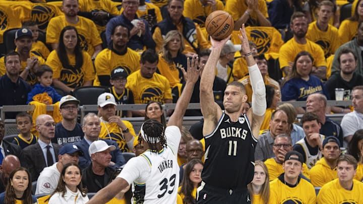 Apr 19, 2025; Indianapolis, Indiana, USA; Milwaukee Bucks center Brook Lopez (11) shoots the ball while Indiana Pacers center Myles Turner (33) defends in the first half at Gainbridge Fieldhouse. Mandatory Credit: Trevor Ruszkowski-Imagn Images Apr 19, 2025; Indianapolis, Indiana, USA; Milwaukee Bucks center Brook Lopez (11) shoots the ball while Indiana Pacers center Myles Turner (33) defends in the first half at Gainbridge Fieldhouse. Mandatory Credit: Trevor Ruszkowski-Imagn Images