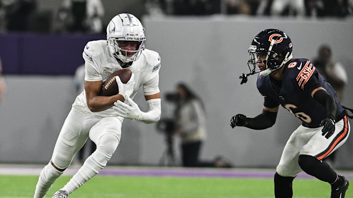 Dec 16, 2024; Minneapolis, Minnesota, USA; Minnesota Vikings wide receiver Justin Jefferson (18) runs after the catch as Chicago Bears cornerback Kyler Gordon (6) defends during the second quarter at U.S. Bank Stadium. Mandatory Credit: Jeffrey Becker-Imagn Images