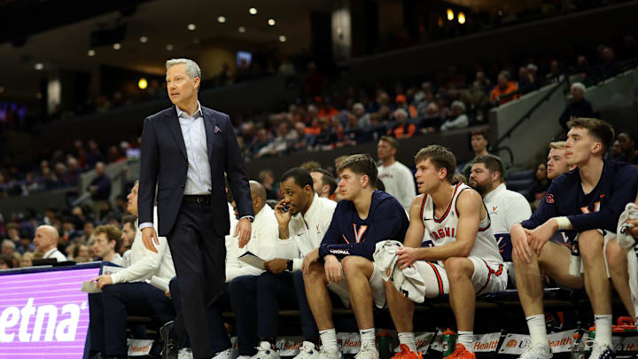 Dec 22, 2025; Charlottesville, Virginia, USA; Virginia Cavaliers head coach Ryan Odom looks on from the bench against the American University Eagles in the first half at John Paul Jones Arena. Mandatory Credit: Geoff Burke-Imagn Images