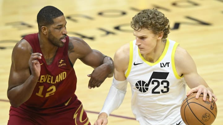Dec 20, 2023; Cleveland, Ohio, USA; Cleveland Cavaliers center Tristan Thompson (12) defends Utah Jazz forward Lauri Markkanen (23) in the fourth quarter at Rocket Mortgage FieldHouse. Mandatory Credit: David Richard-Imagn Images Dec 20, 2023; Cleveland, Ohio, USA; Cleveland Cavaliers center Tristan Thompson (12) defends Utah Jazz forward Lauri Markkanen (23) in the fourth quarter at Rocket Mortgage FieldHouse. Mandatory Credit: David Richard-Imagn Images