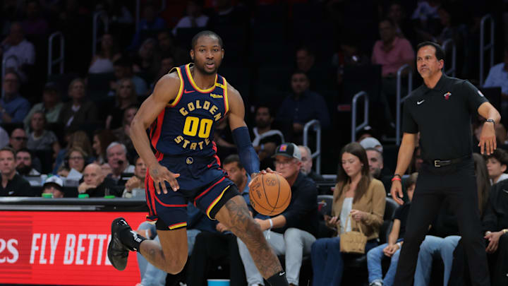 Mar 25, 2025; Miami, Florida, USA; Golden State Warriors forward Jonathan Kuminga (00) drives to the basket against the Miami Heat during the second quarter at Kaseya Center. Mandatory Credit: Sam Navarro-Imagn Images Mar 25, 2025; Miami, Florida, USA; Golden State Warriors forward Jonathan Kuminga (00) drives to the basket against the Miami Heat during the second quarter at Kaseya Center. Mandatory Credit: Sam Navarro-Imagn Images