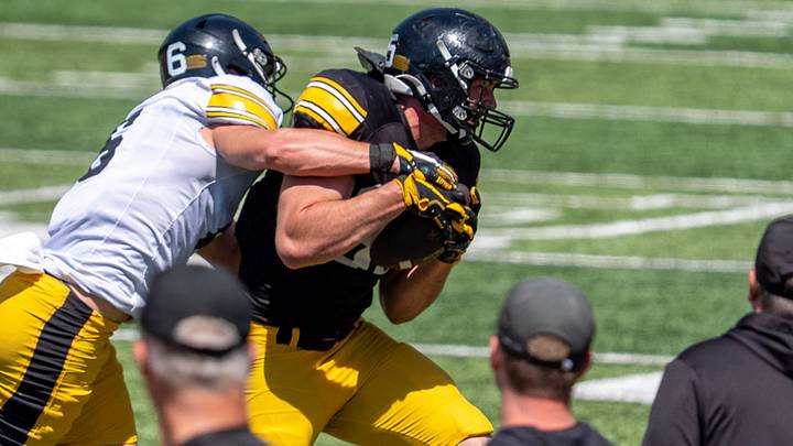 Iowa defensive back Zach Lutmer (6) defends a pass to tight end Thomas Meyer (85) April 25, 2026 during the team’s spring practice at Kinnick Stadium in Iowa City, Iowa.