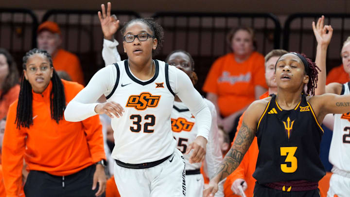 Oklahoma State Cowgirls guard Stailee Heard (32) looks up beside Arizona State Sun Devils guard Tyi Skinner (3) after making a 3-pointer during a women's college basketball game between the Oklahoma State Cowgirls (OSU) and the Arizona State Sun Devils at Gallagher-Iba Arena in Stillwater, Okla., Wednesday, Jan. 29, 2025. Oklahoma State Cowgirls guard Stailee Heard (32) looks up beside Arizona State Sun Devils guard Tyi Skinner (3) after making a 3-pointer during a women's college basketball game between the Oklahoma State Cowgirls (OSU) and the Arizona State Sun Devils at Gallagher-Iba Arena in Stillwater, Okla., Wednesday, Jan. 29, 2025.