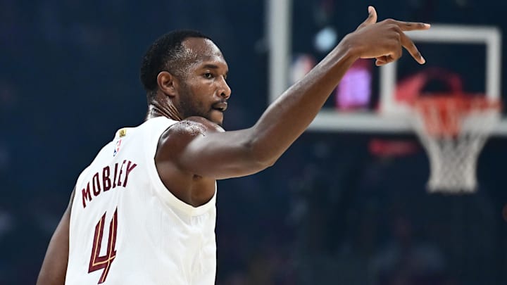 Oct 7, 2025; Cleveland, Ohio, USA; Cleveland Cavaliers forward Evan Mobley (4) celebrates after hitting a three point basket during the first quarter against the Chicago Bulls at Rocket Arena. Mandatory Credit: Ken Blaze-Imagn Images