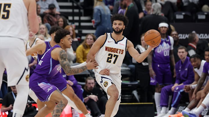 Dec 30, 2024; Salt Lake City, Utah, USA;  Denver Nuggets guard Jamal Murray (27) looks to pass the ball during the second half against the Utah Jazz at Delta Center. Mandatory Credit: Chris Nicoll-Imagn Images