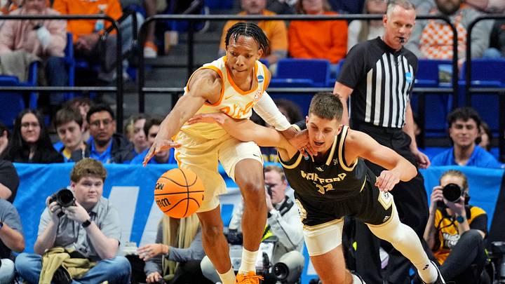 Mar 20, 2025; Lexington, KY, USA; Wofford Terriers forward Jeremy Lorenz (32) and Tennessee Volunteers guard Jordan Gainey (11) go for a loose ball during the second half in the first round of the NCAA Tournament at Rupp Arena. Mandatory Credit: Aaron Doster-Imagn Images Mar 20, 2025; Lexington, KY, USA; Wofford Terriers forward Jeremy Lorenz (32) and Tennessee Volunteers guard Jordan Gainey (11) go for a loose ball during the second half in the first round of the NCAA Tournament at Rupp Arena. Mandatory Credit: Aaron Doster-Imagn Images
