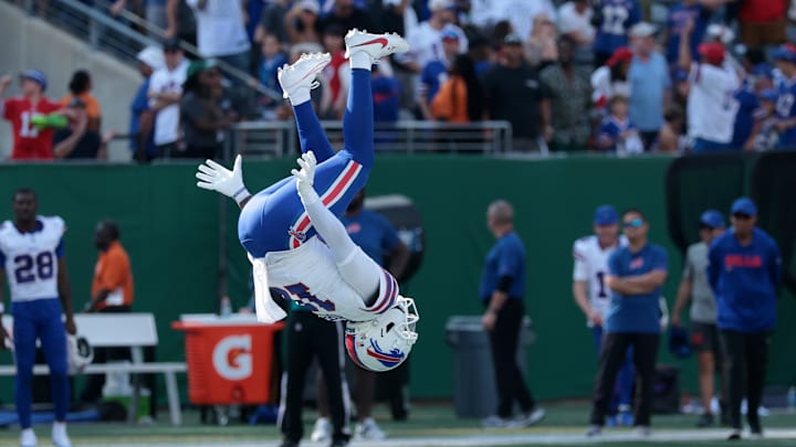 Sep 14, 2025; East Rutherford, New Jersey, USA; Buffalo Bills wide receiver Elijah Moore (18) reacts by doing a flip against the New York Jets during the second half at MetLife Stadium.